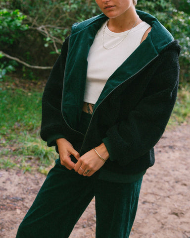 Woman wearing Gables Cord Reversible Jacket in Green Gables