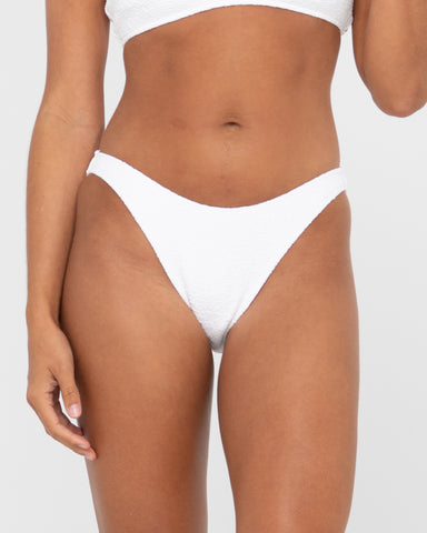 Woman wearing Sandalwood Classic Bikini Pant in Bright White