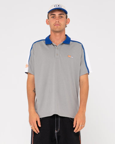 Man wearing Oxecutioner Short Sleeve Polo in Oyster Grey