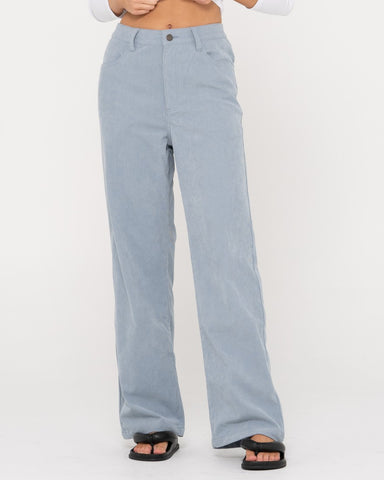 Woman wearing The Secret Cord Pant in Blue Bell
