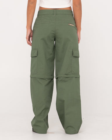 Woman wearing Transformer Low Cargo Zip Off Pant in Army Green