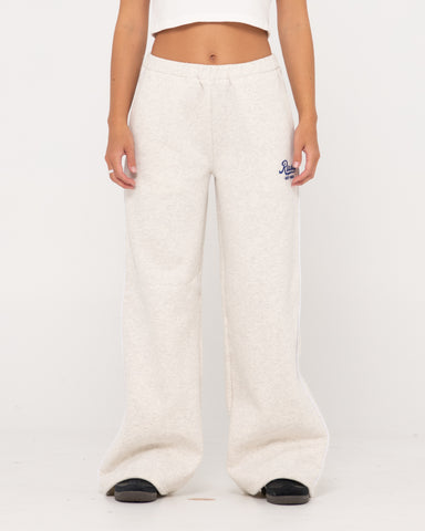 Woman wearing Maxo Relaxo Low Rise Wide Leg Track Pant in White Marle 1