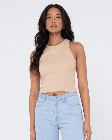 Woman wearing Connect Racer Tank in Pale Mustard