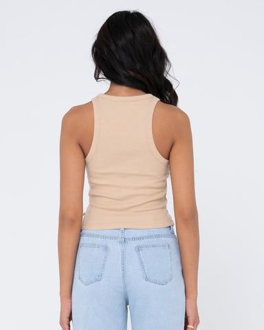 Woman wearing Connect Racer Tank in Pale Mustard