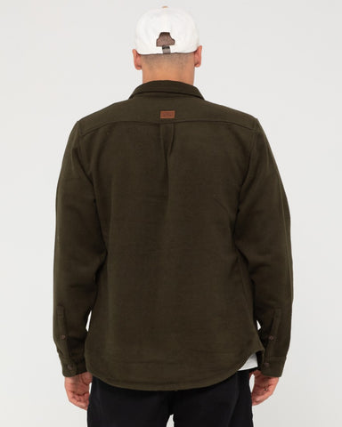 Man wearing Melton Workwear Long Sleeve Shirt in Military Olive