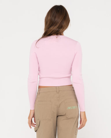 Woman wearing Amelia Cropped Long Sleeve Knit Top in Soft Orchid