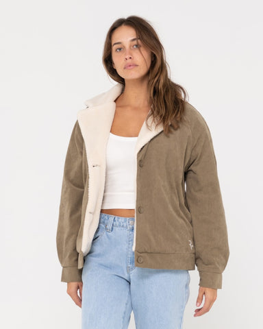 Woman wearing The Secret Relaxed Fit Cord Jacket in Faded Pistachio