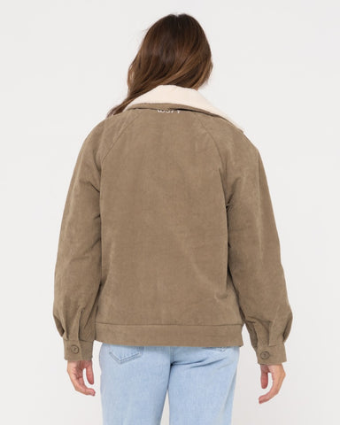 Woman wearing The Secret Relaxed Fit Cord Jacket in Faded Pistachio