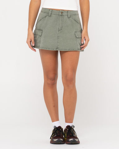 Woman wearing Brooks Low Rise Twill Cargo Skirt in Faded Pistachio
