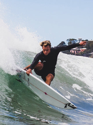 man wearing A Series Ecoprene 1.5mm Long Sleeve Wetsuit Jacket in Black