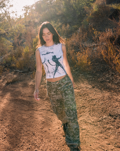 Woman wearing Ricardio Low Rise Cargo Pant in Camo