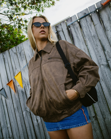 Woman wearing Back Street Faux Leather Jacket in Brown