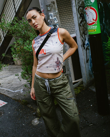 Woman wearing Tank Girl Low Rise Wide Fit Cargo Pant in Army