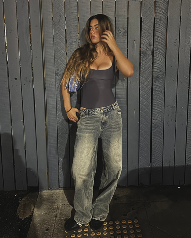 Woman wearing Low Rise Super Baggy Denim Jean in Dirty Dawg