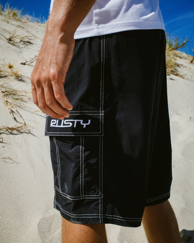 Man wearing Pick Pocket Elastic Waist Boardshort in Black