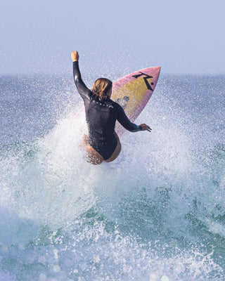 man wearing A Series Ecoprene 1.5mm Long Sleeve Wetsuit Jacket in Black