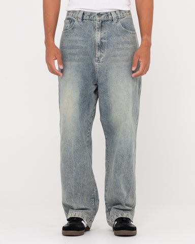 Man wearing Stone Cold Denim Jean in Dirty Dawg