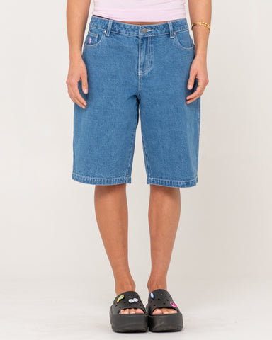 Woman wearing Rock Hot Low Rise Denim Jorts in Blue