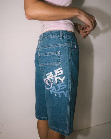 Woman wearing Rock Hot Low Rise Denim Jorts in Blue