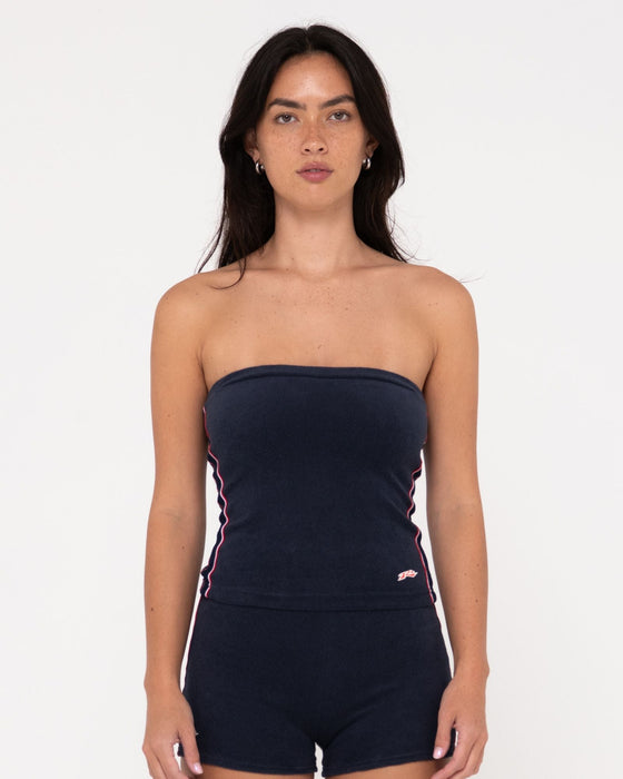 woman-wearing-bodhi-towelling-tube-top-in-navy