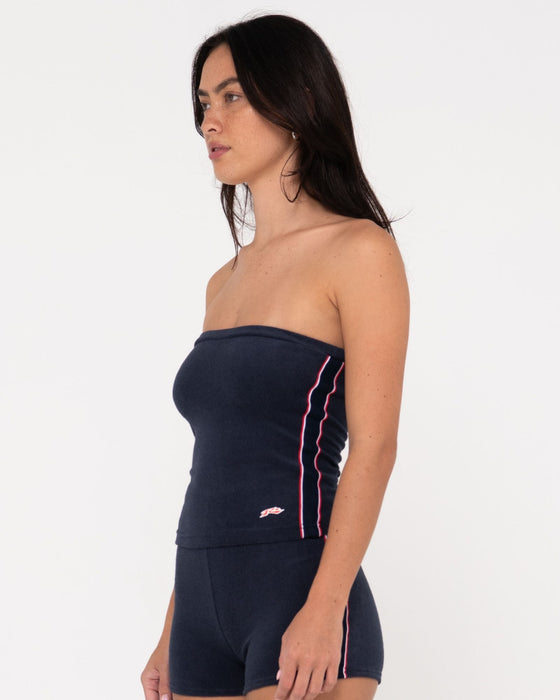 woman-wearing-bodhi-towelling-tube-top-in-navy