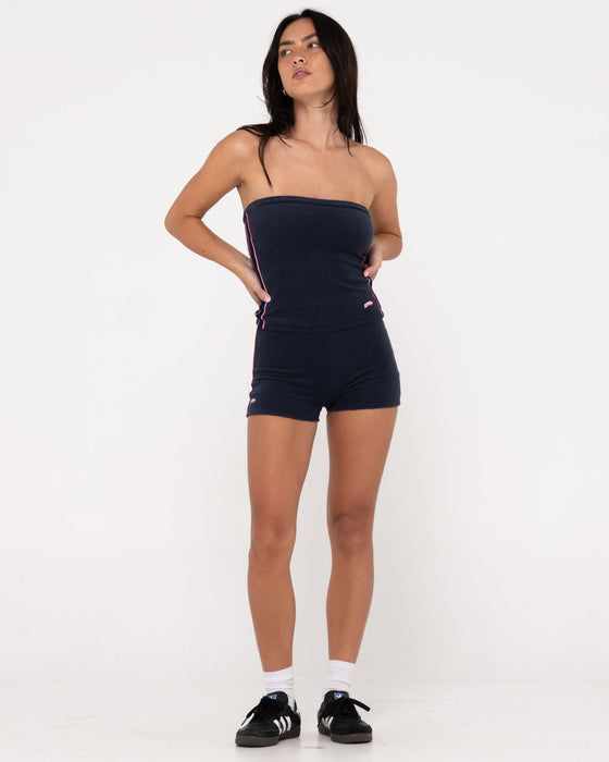 woman-wearing-bodhi-towelling-tube-top-in-navy
