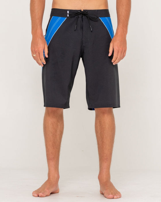 man-wearing-stingray-fixed-waist-boardshort-in-black