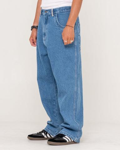 Man wearing Boonta Baggy Jean in Blue