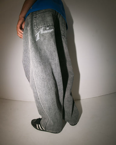 Man wearing Stitch Up Baggy Jean in Black