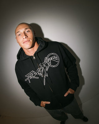 Man wearing Hoodus Zip Thru Hooded Fleece in Black