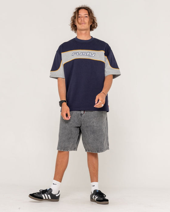 man-wearing-stitch-up-jort-in-washed-black