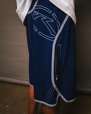 Man wearing Voltron Fixed Waist Boardshort in Dark Blue