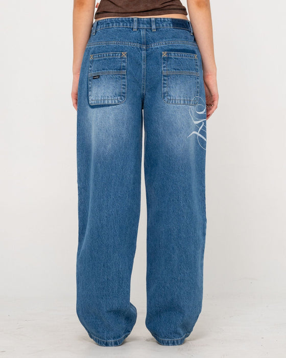 woman-wearing-he-ghosted-bethany-baggy-low-rise-jean-in-blasted-middy-blue