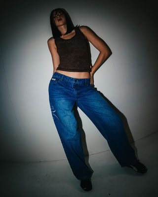 Woman wearing He Ghosted Bethany Baggy Low Rise Jean in Blasted Middy Blue