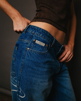 Woman wearing He Ghosted Bethany Baggy Low Rise Jean in Blasted Middy Blue