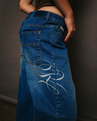 Woman wearing He Ghosted Bethany Baggy Low Rise Jean in Blasted Middy Blue