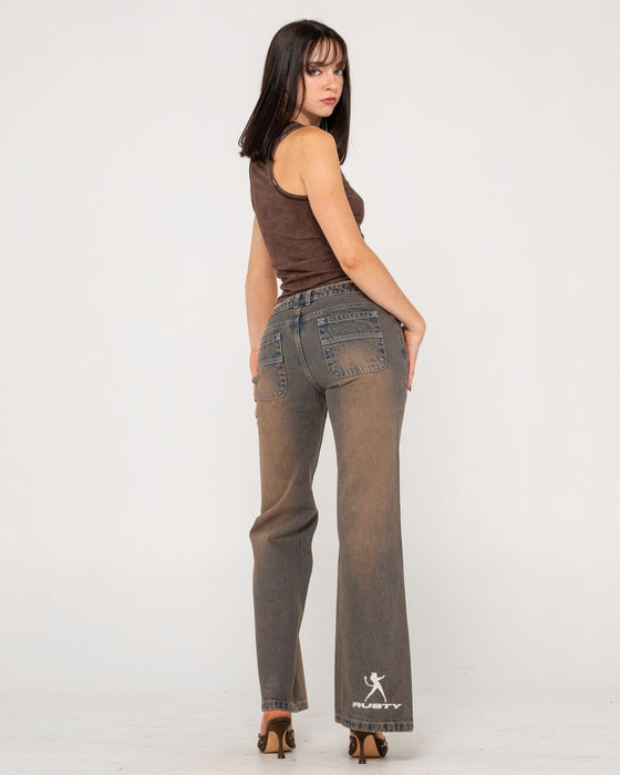 woman-wearing-lucky-number-low-rise-flare-jeans-in-rusty-overdye