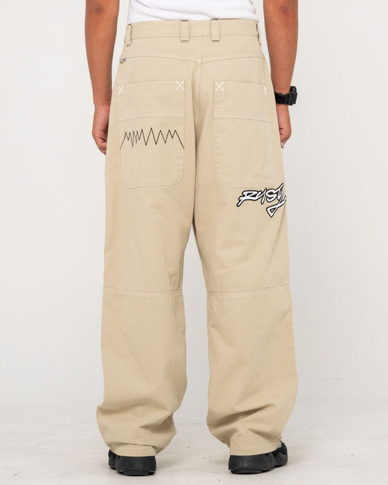 man-wearing-step-stone-baggy-pant-in-abbey-stone