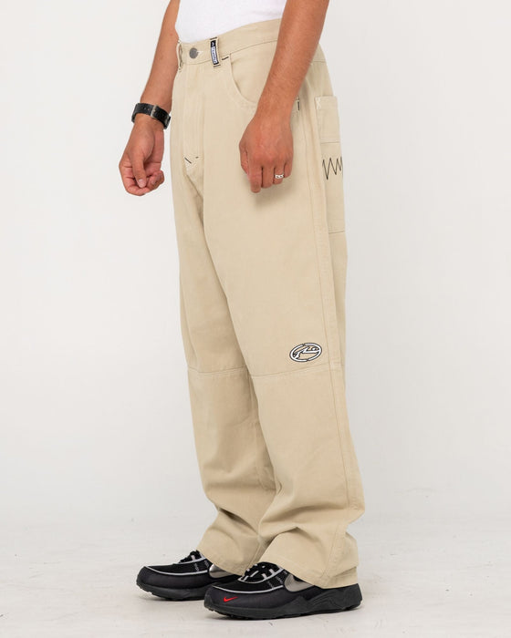 man-wearing-step-stone-baggy-pant-in-abbey-stone
