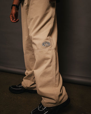 Man wearing Step-stone Baggy Pant in Abbey Stone