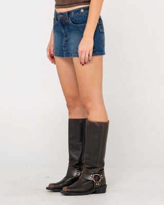Woman wearing Blasted Eye Let Loose Denim Micro Skirt in Blasted Deep Sea Blue