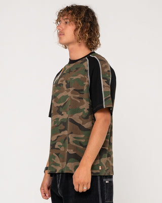 Man wearing Woof Raglan Short Sleeve Tee in Camo