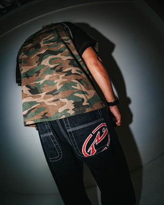 Man wearing Woof Raglan Short Sleeve Tee in Camo