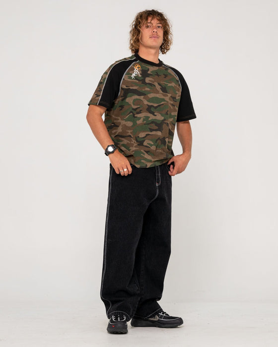 man-wearing-woof-raglan-short-sleeve-tee-in-camo