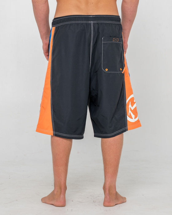 man-wearing-carnage-hybrid-waist-boardshort-in-black