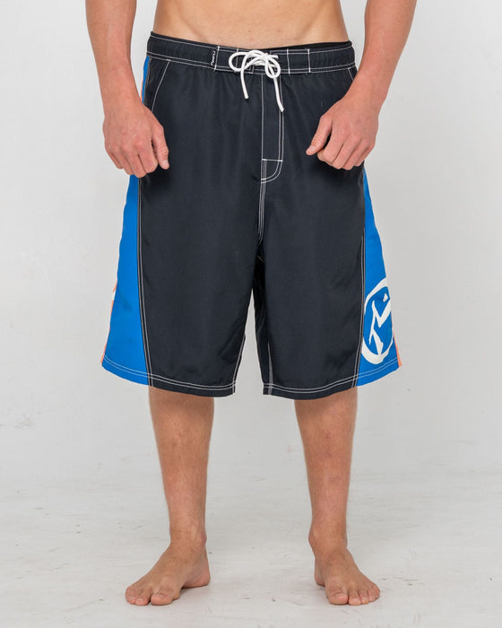 man-wearing-carnage-hybrid-waist-boardshort-in-black