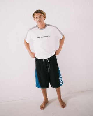 Man wearing Carnage Hybrid Waist Boardshort in Black