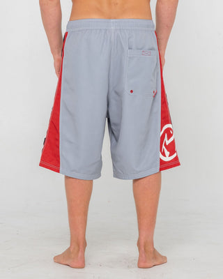 Man wearing Carnage Hybrid Waist Boardshort in Stone Grey