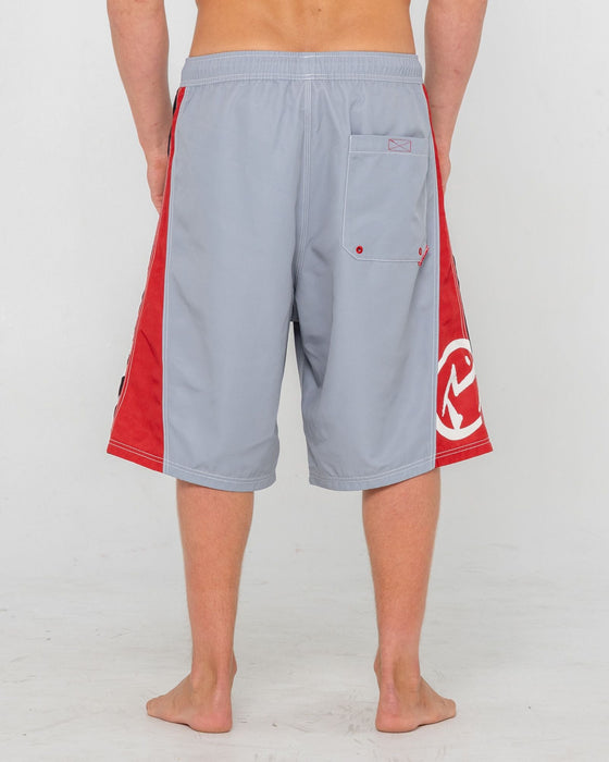 man-wearing-carnage-hybrid-waist-boardshort-in-stone-grey