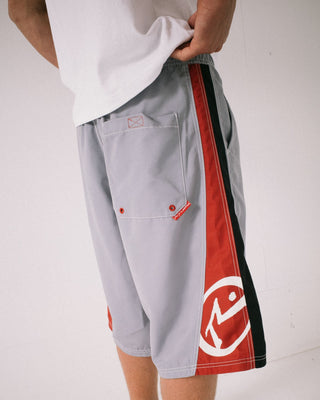 Man wearing Carnage Hybrid Waist Boardshort in Stone Grey